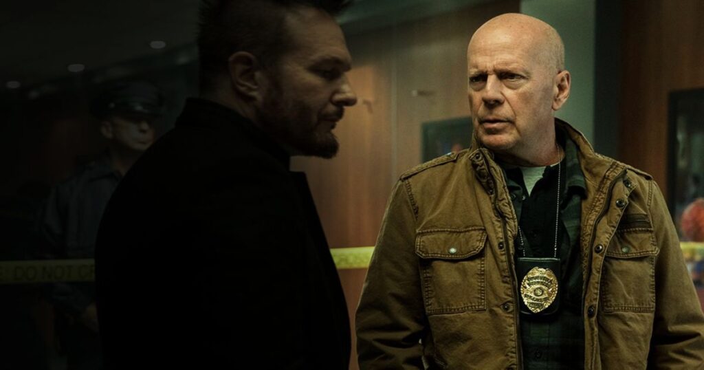 Bruce Willis as James Knight talking to a criminal